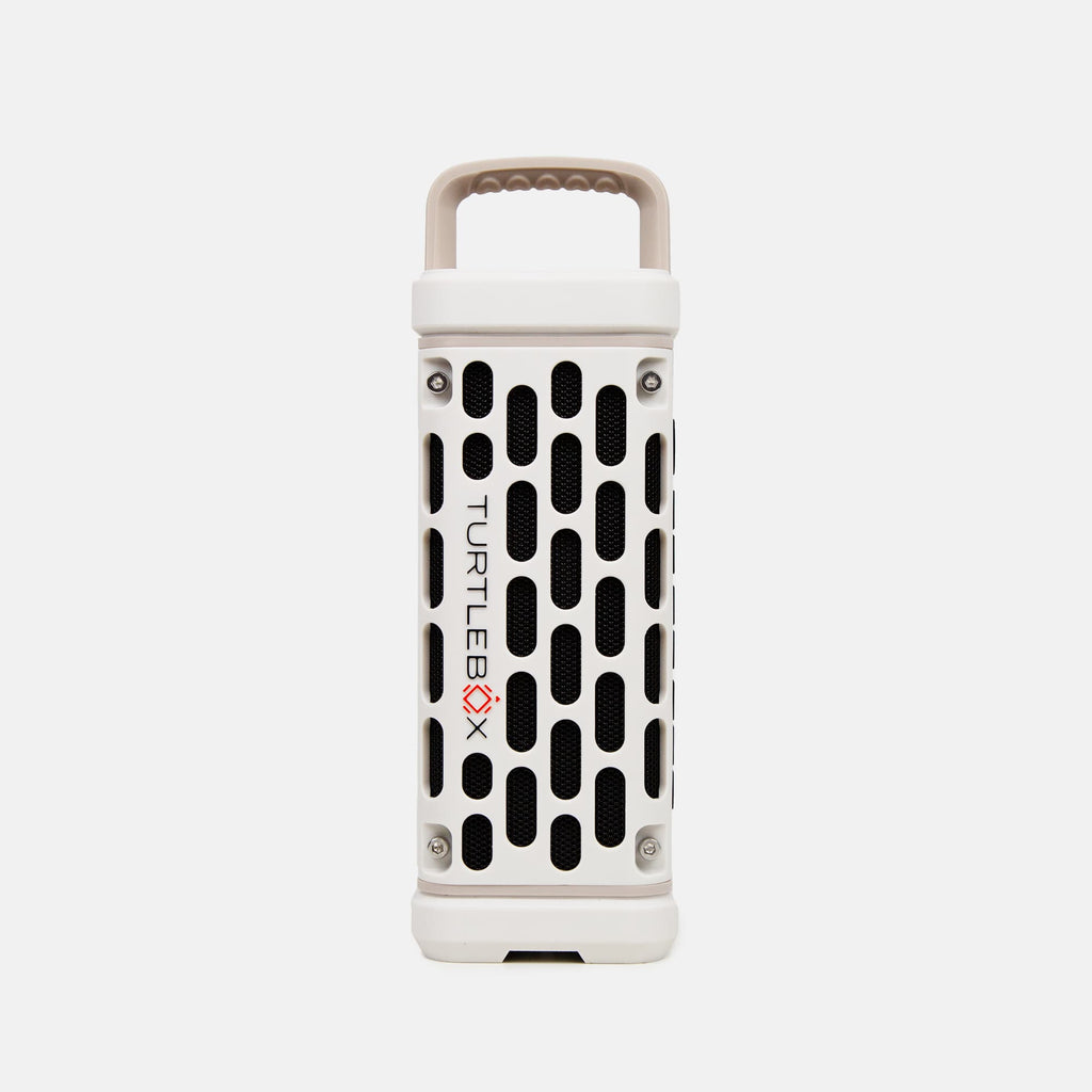 The Turtlebox Ranger speaker in ivory, standing upright with its carry handle on top.
